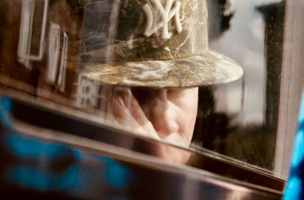 Reflected portrait on train, 14/3/26