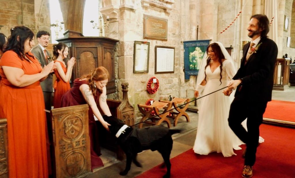 Down aisle with dog, 5/9/26
